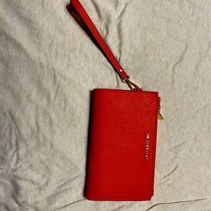 Brand new with tags Michael Kors wristlet.